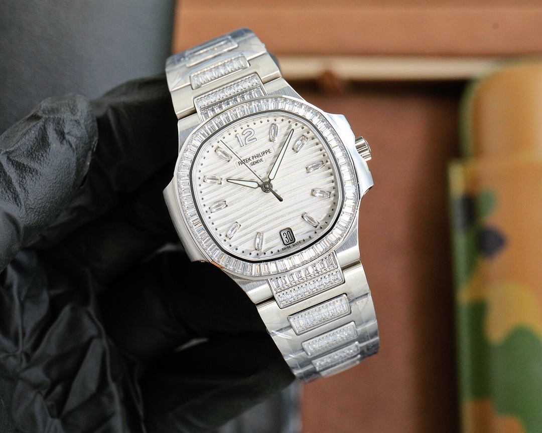 Patek Philippe Nautilus Ladies White Gold Diamond Bezel 7118