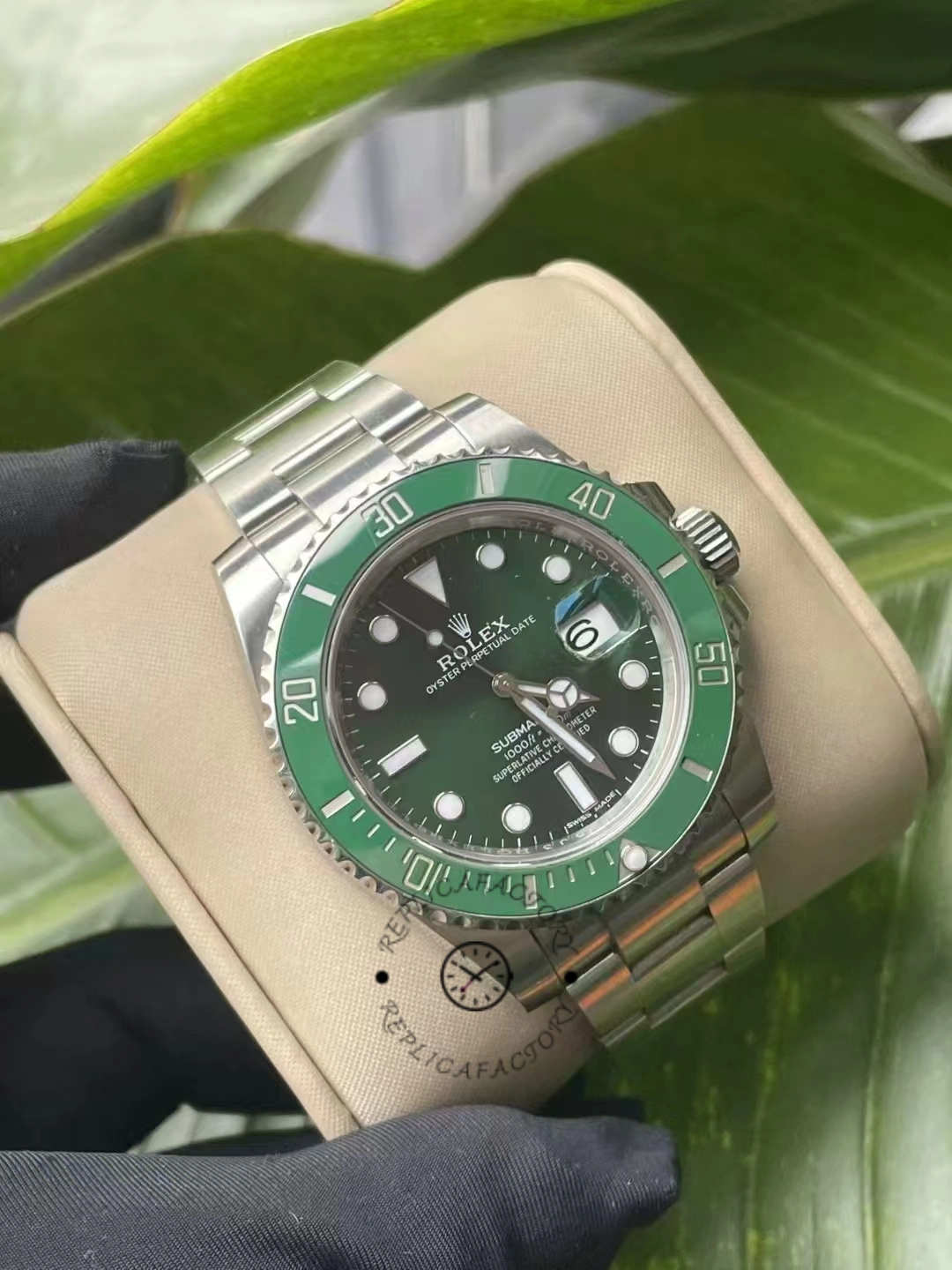 Side-angled display of Rolex Submariner Date 116610LV highlighting dial texture and polished finish.