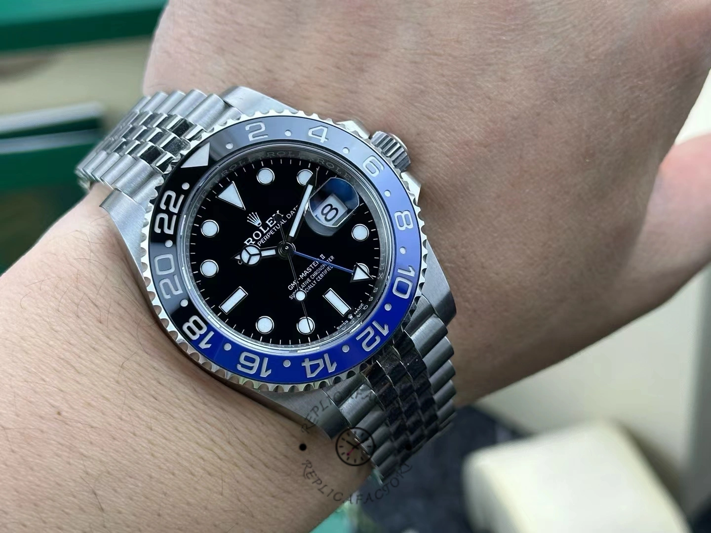 Wrist shot of Rolex GMT-Master II 126710BLNR-0002 after a year of daily wear, showing comfort fit and case shine.