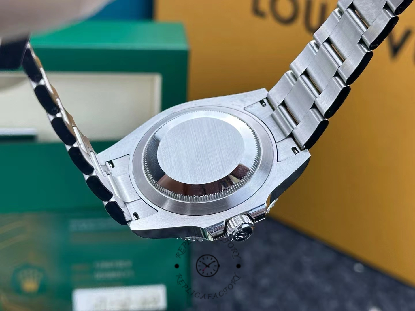 Back view of Rolex Submariner 126610LV after 3 years, showing caseback wear.