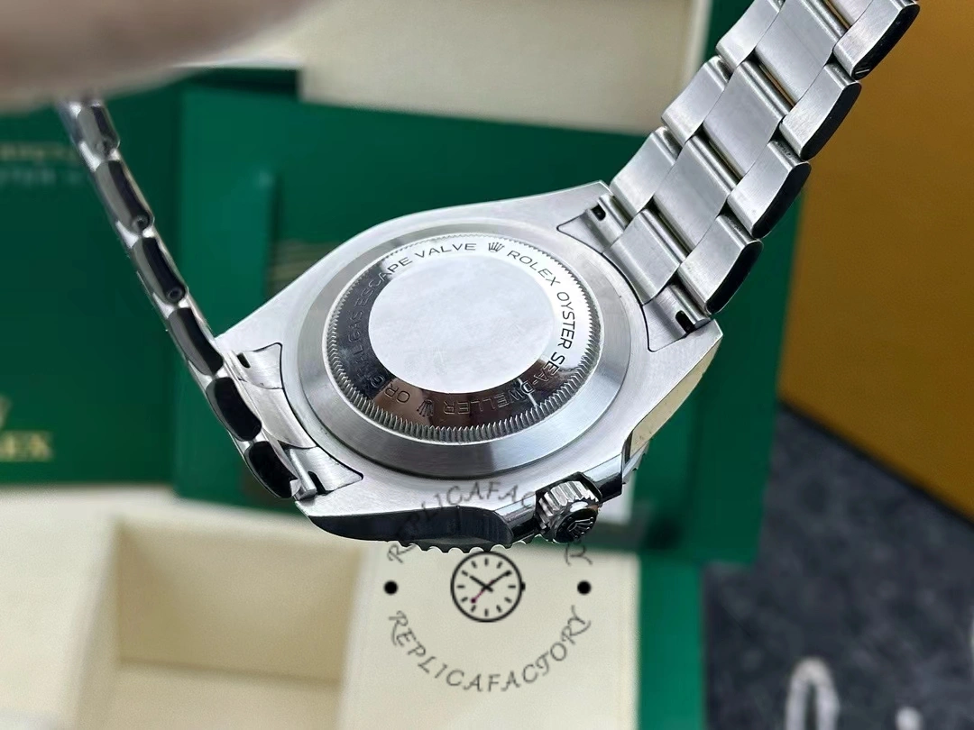 Caseback of Rolex Sea-Dweller 126600-0002 showing helium escape valve and engraved markings.