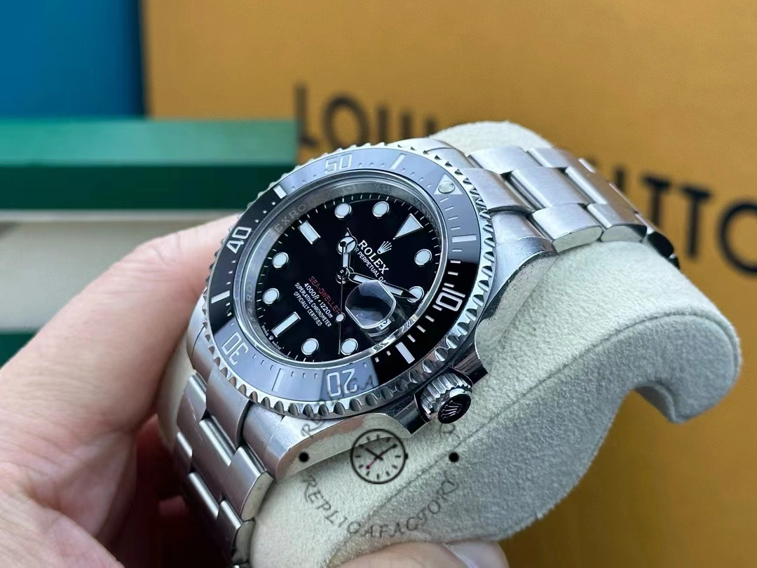 Side profile of Rolex Sea-Dweller 126600-0002 with visible crown and ceramic rotating bezel.