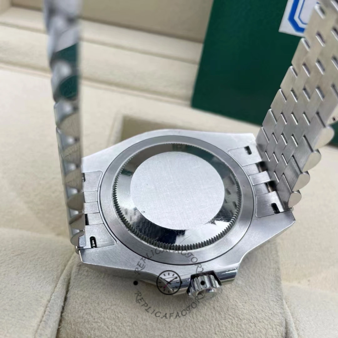 Caseback view of Rolex GMT-Master II 126710BLRO showing brushed steel and Jubilee bracelet links.