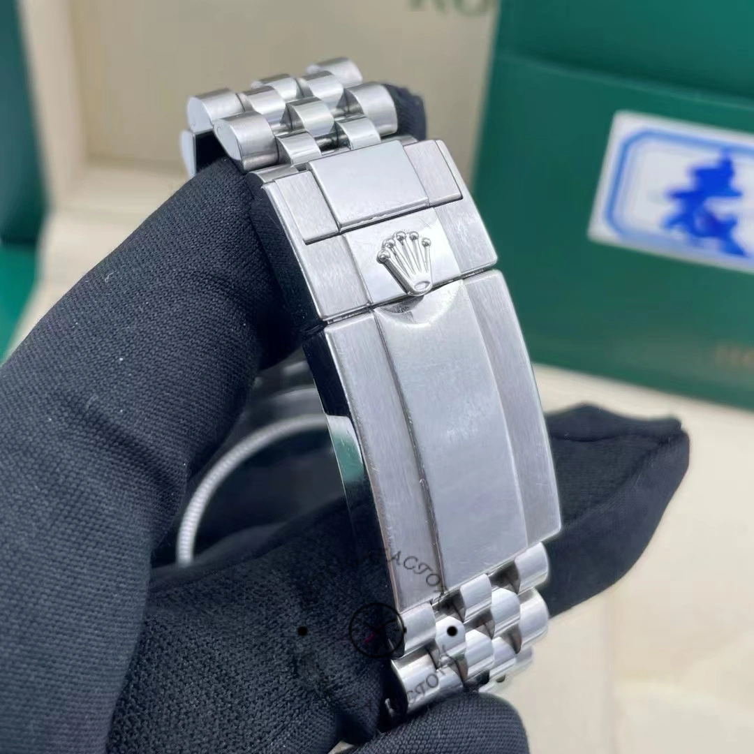 Clasp view of Rolex GMT-Master II 126710BLRO showing Rolex crown logo and brushed finish.