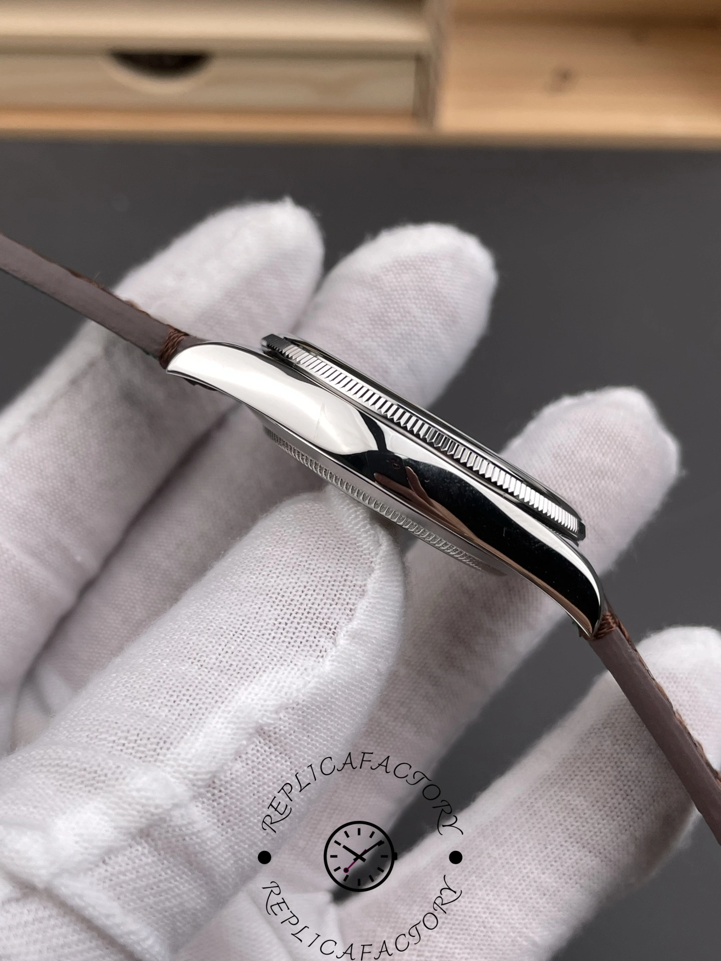 Side profile of the Rolex 1908 52506-0002 showing thin case and domed crystal.