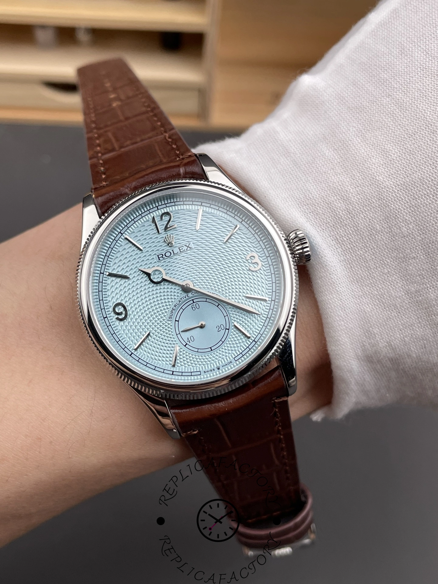 Wrist shot of the Rolex 1908 52506-0002 replica showing dial size and strap fit.