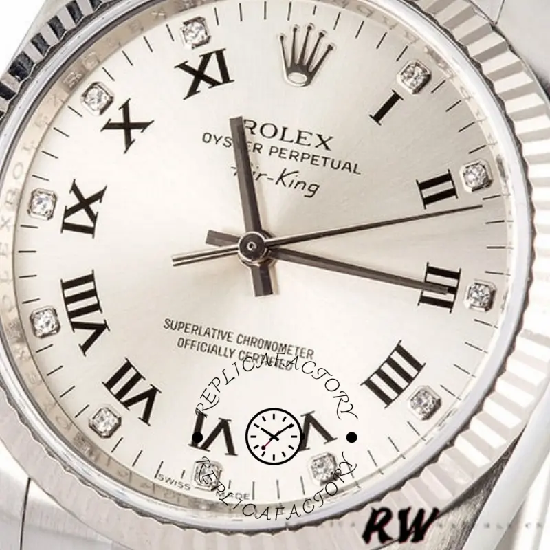Rolex Air-King 114234 dial close-up, silver Roman numerals and diamond markers, fluted bezel detail.