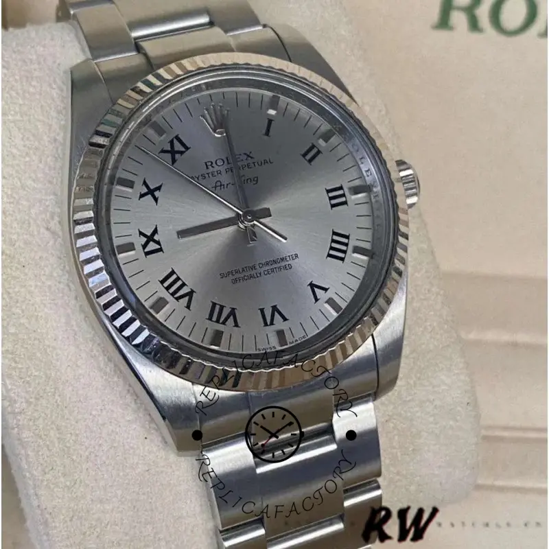 Rolex Air-King 114234, silver dial close-up with fluted bezel, angled front view.