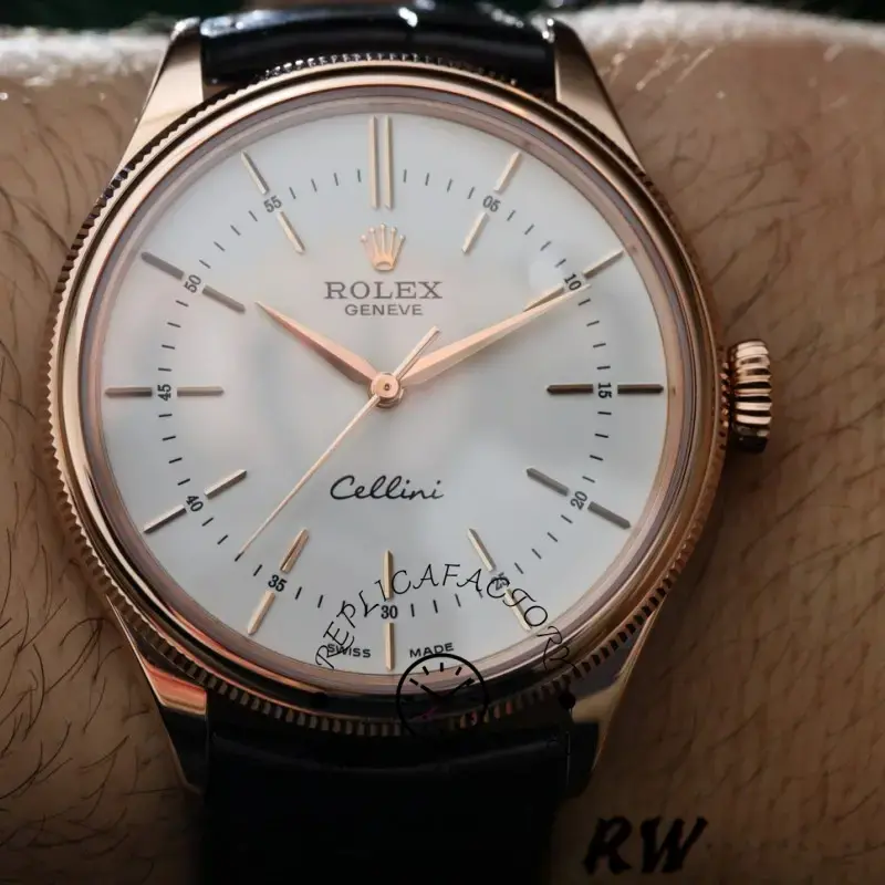 Rolex Cellini Time 50505, white dial with rose gold markers, black leather strap, side view.