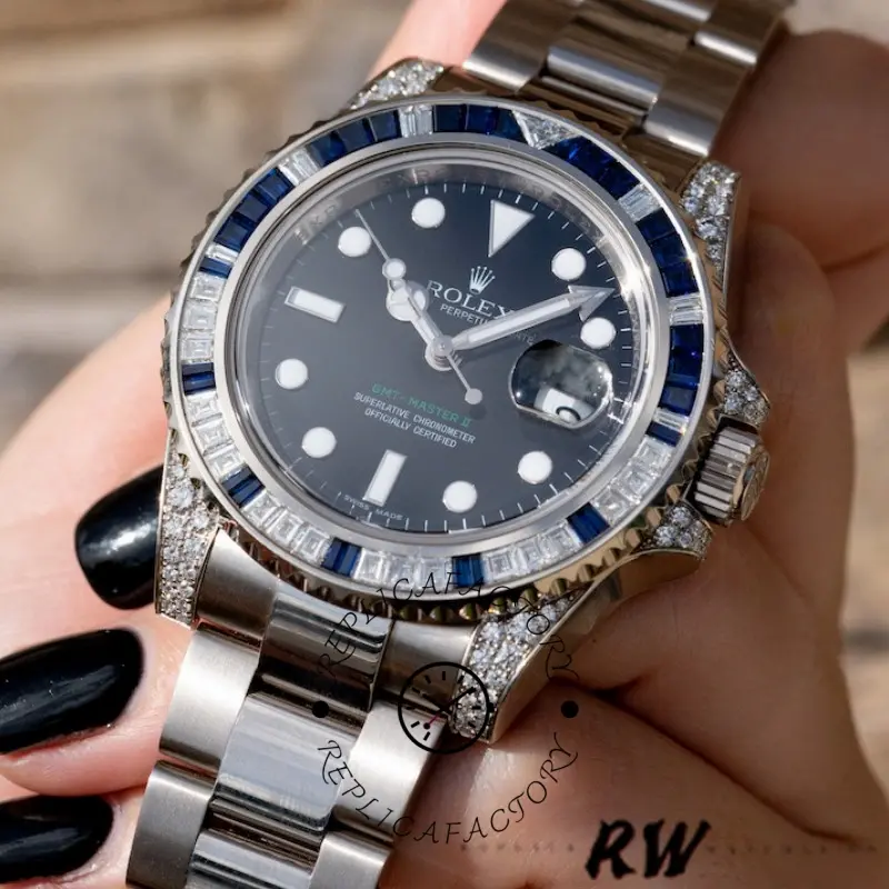 Rolex GMT-Master II 116759SA, hand-held close-up showing black dial, bezel, and markers.