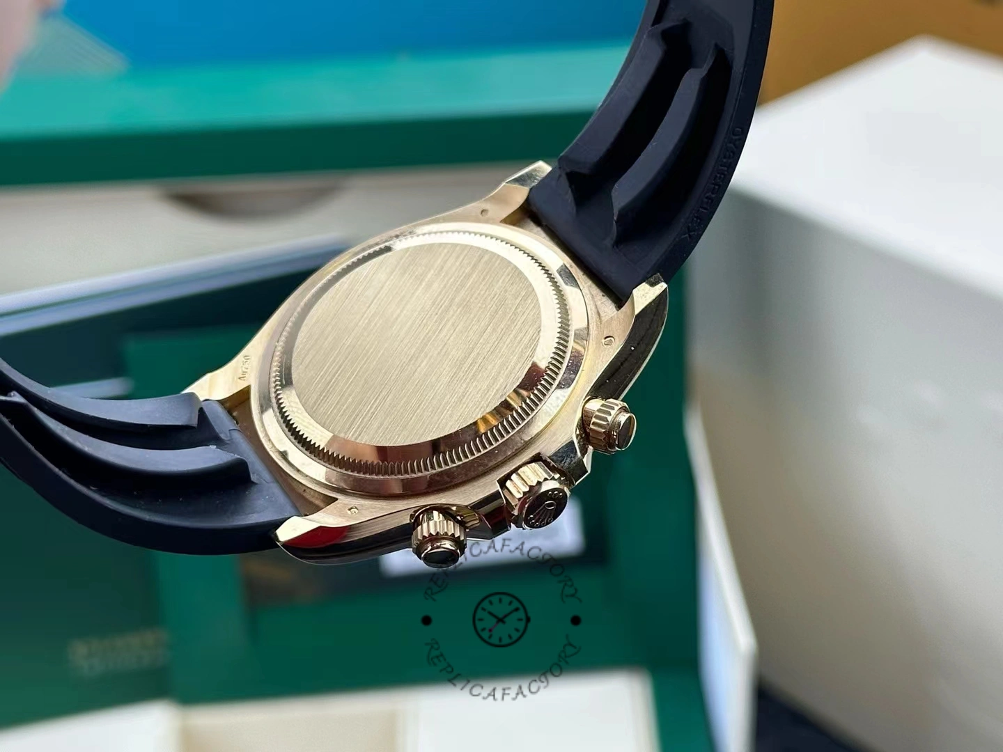 Rear case view of Rolex Daytona 126518LN showing brushed gold caseback and screw-down crown.